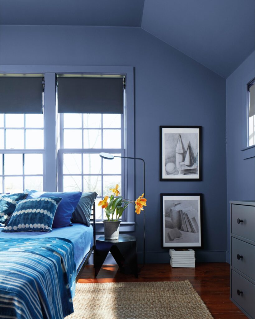 Bedroom painted in Benjamin Moore Nova Blue color of the year.